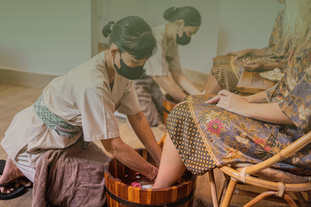 Two guests enjoying a foot bath at Montebello spa in Jimbaran