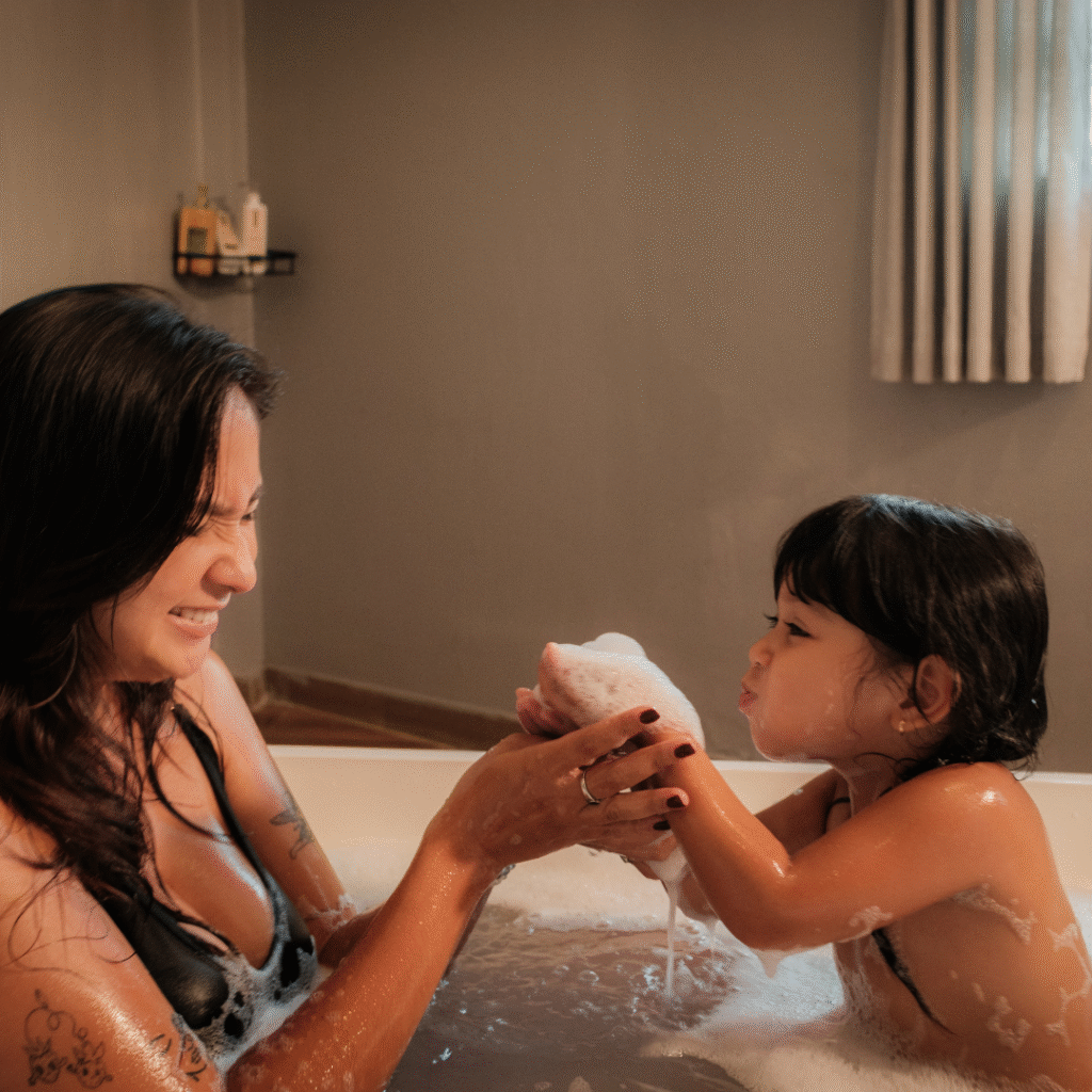 A mother and child sharing bath time at Montebello